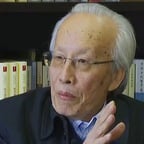 孙正聿（红色背景老头）